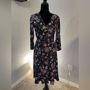 Nice black long sleeved dress. Could be formal or casual very comfortable style